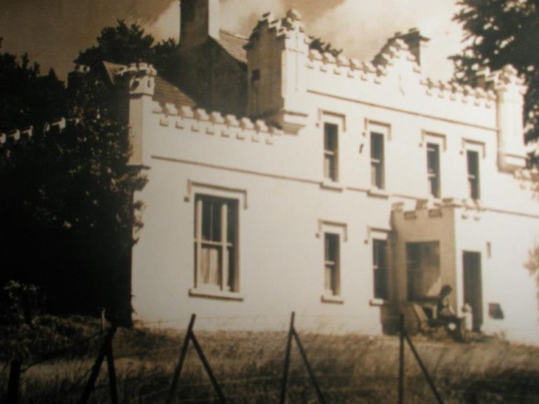 scan of an old black and white sepia photo of the exterior photo of historic guesthouse Newpark House in Ennis, Co Clare